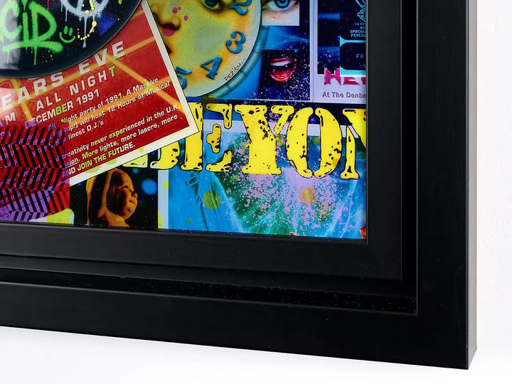A limited edition mixed media piece by Dan Pearce of lots of differrent vinyl records with spraypaint and designs all over them, the title is In The Mix