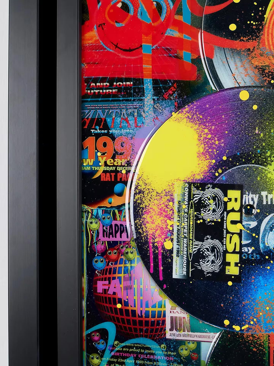 A limited edition mixed media piece by Dan Pearce of lots of differrent vinyl records with spraypaint and designs all over them, the title is In The Mix