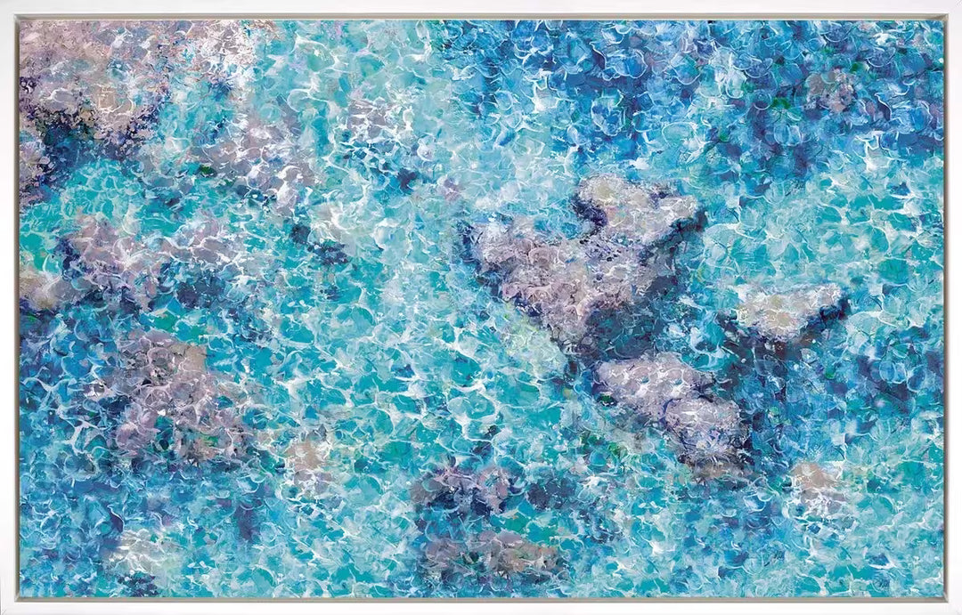 An Antonio Sannino framed limited edition piece of clear water rippling over some rocks, the title is Infinite Blue