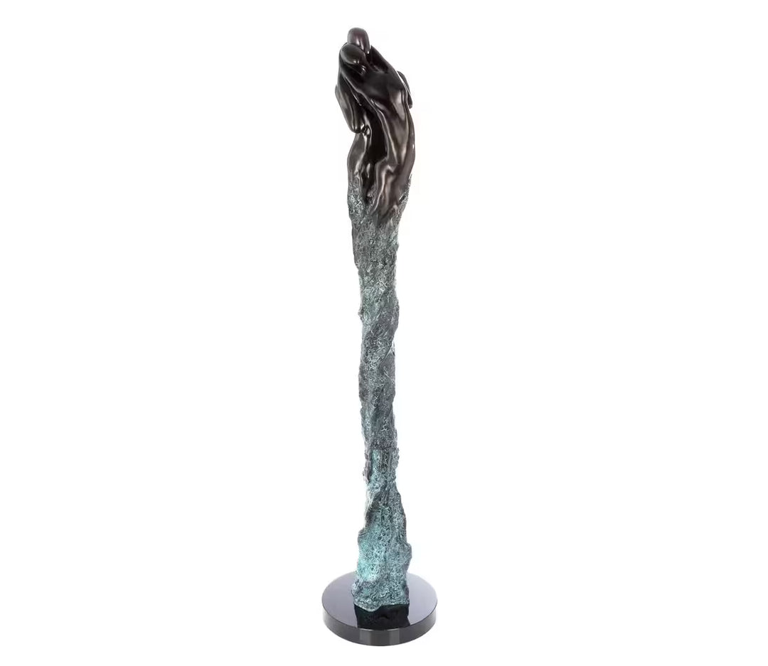 A Jennine Parker limited edition sculpture of two people merged together, the title is Intertwined II