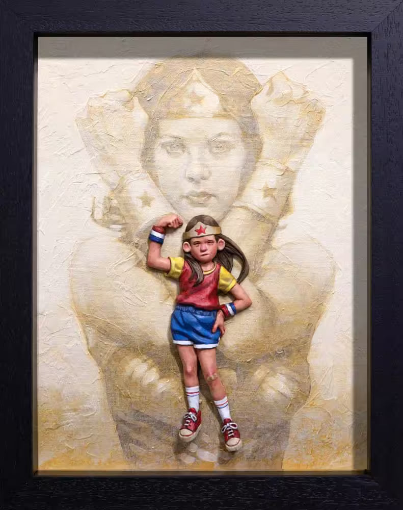 A Craig Davison limited edition of a little girl dressed like Wonder Woman with Wonder Woman behind her, the title is It&