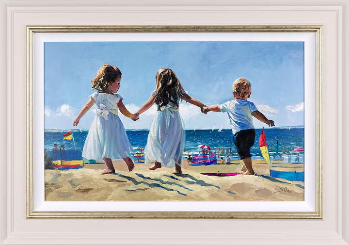 A Sherree Valentine Daines framed limited edition of three children holding hands walking across a beach, the title Joyful Summers Day