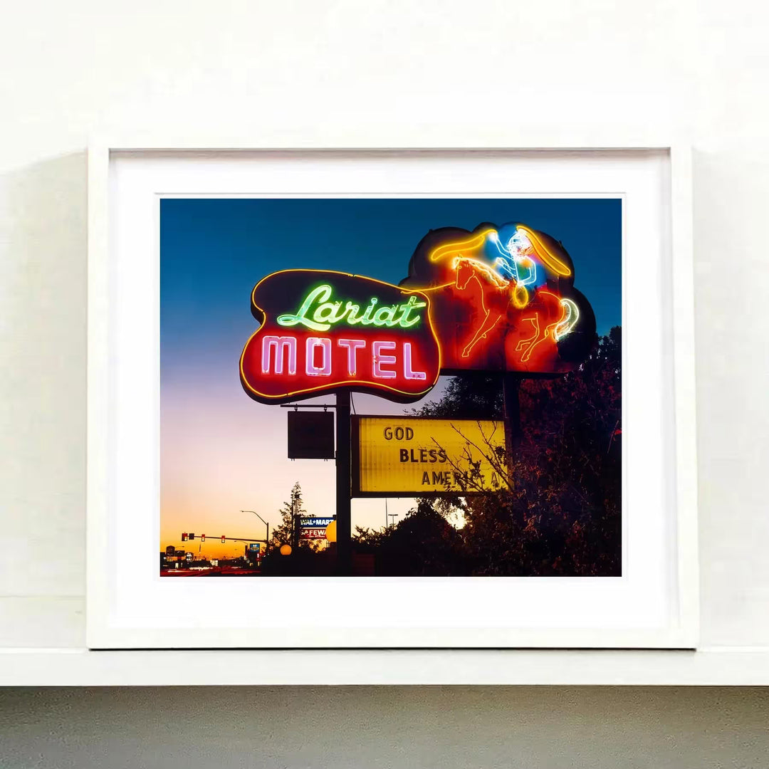A white framed limited edition photograph by Richard Heeps using vibrant colours, the title is Lariat Motel, Fallon, Nevada, 2003