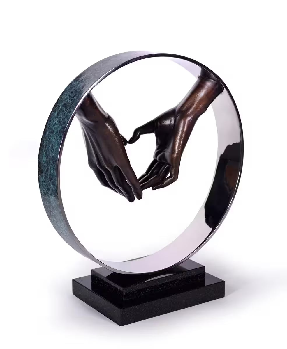 4A Michael Talbot limited edition Brone Sculpture of two hands making a heart, the title is Lasting Love