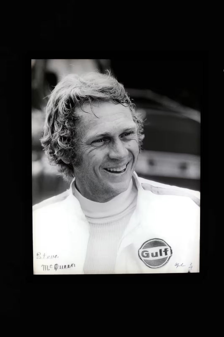 A limited edition by Anwar Hussain of Steve McQueen, the title is Le Mans France Steve McQueen Smiling