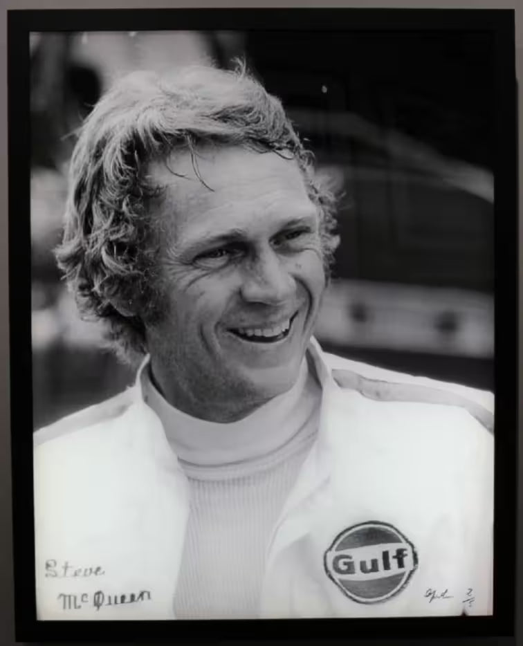 A limited edition by Anwar Hussain of Steve McQueen, the title is Le Mans France Steve McQueen Smiling