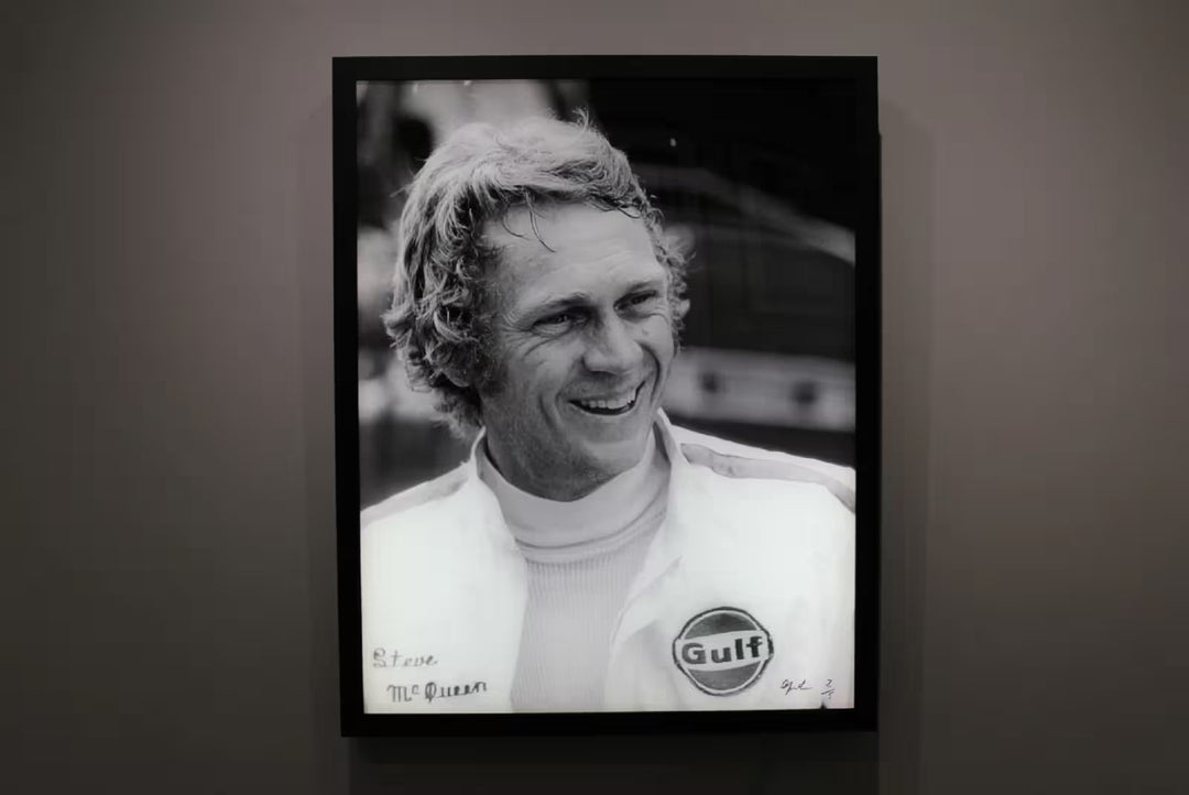 A limited edition by Anwar Hussain of Steve McQueen, the title is Le Mans France Steve McQueen Smiling