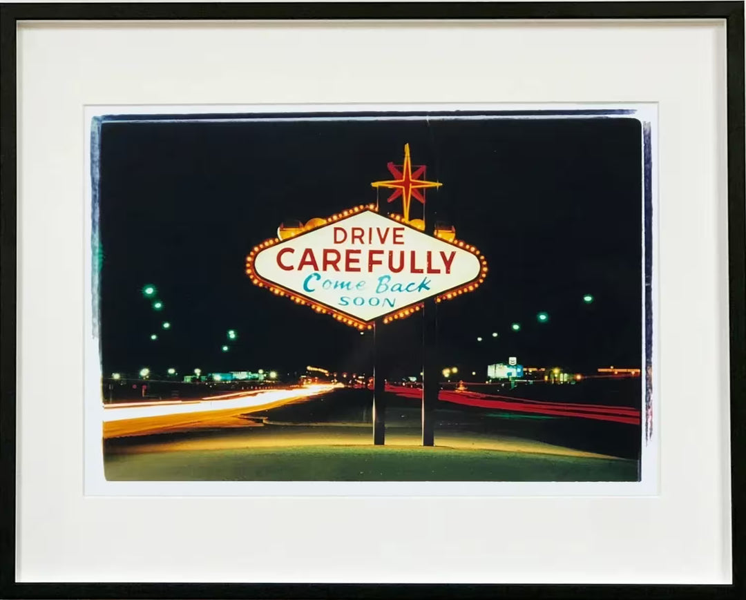A framed limited edition photograph by Richard Heeps using vibrant colours, the title is Leaving Las Vegas 2002