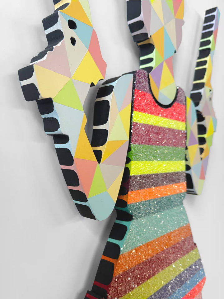 A Lhouette original sculpture, the title is Rabbit Run- Striped/ Geo Confetti- Medium Wall Sculpture