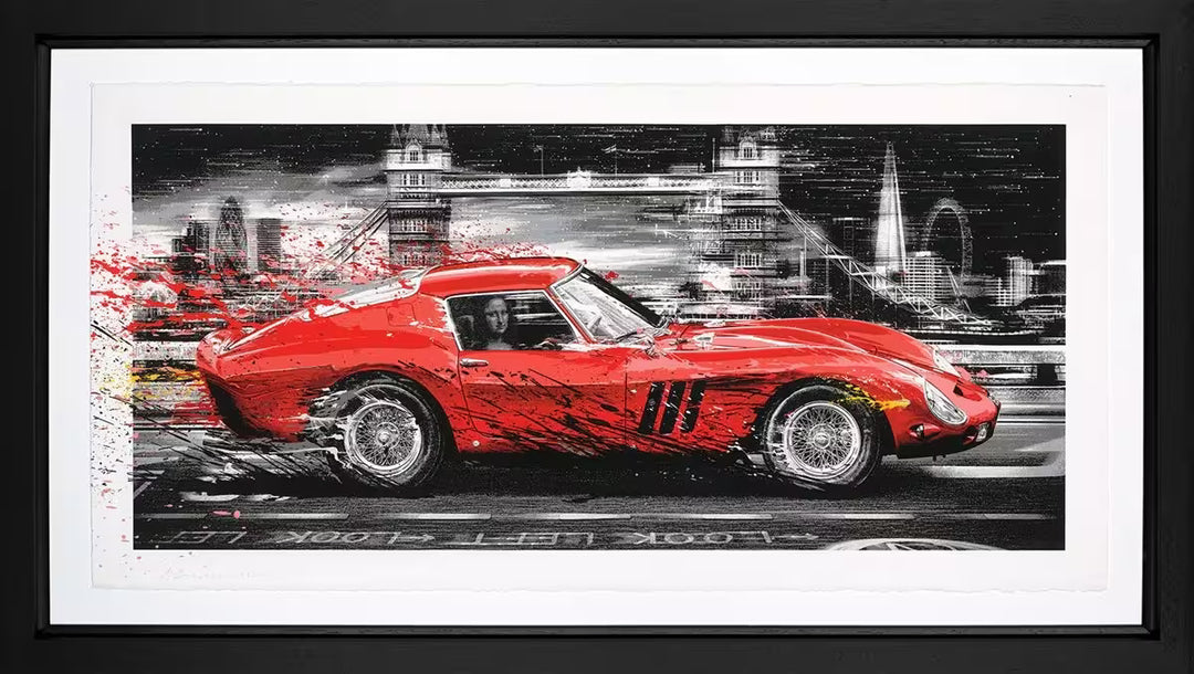 A Mr Brainwash framed limited edition of a red sports car racing through London with the Mona Lisa driving the car, the title is Life In The Fast Lane
