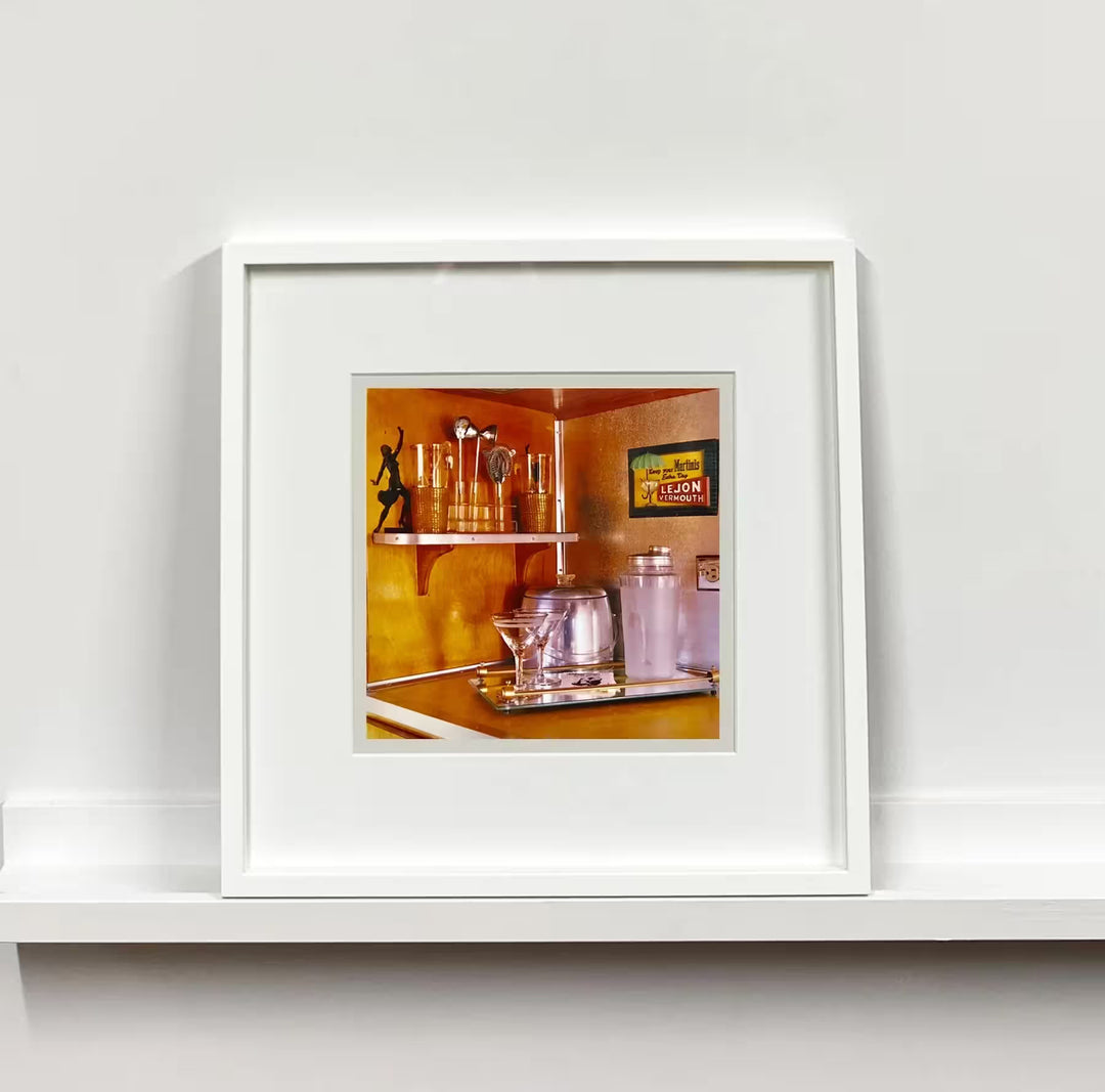 A white framed limited edition photograph by Richard Heeps using vibrant colours, the title is Martini Corner, Bisbee, Arizona, 2001