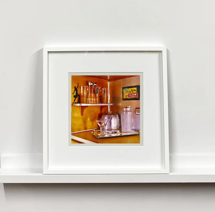 A white framed limited edition photograph by Richard Heeps using vibrant colours, the title is Martini Corner, Bisbee, Arizona, 2001