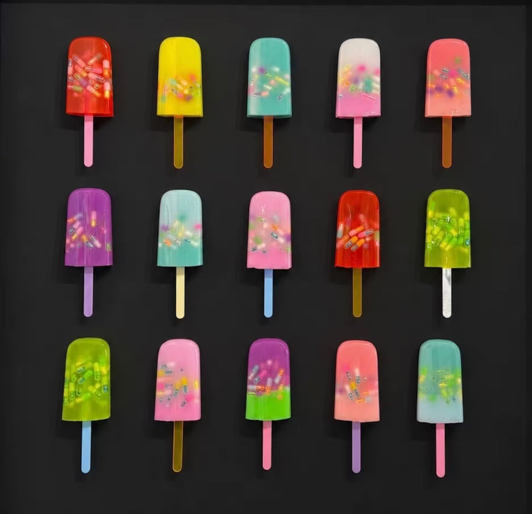 An Emma Gibbons original mixed media piece of 15 lollies, the title is Melting Happiness