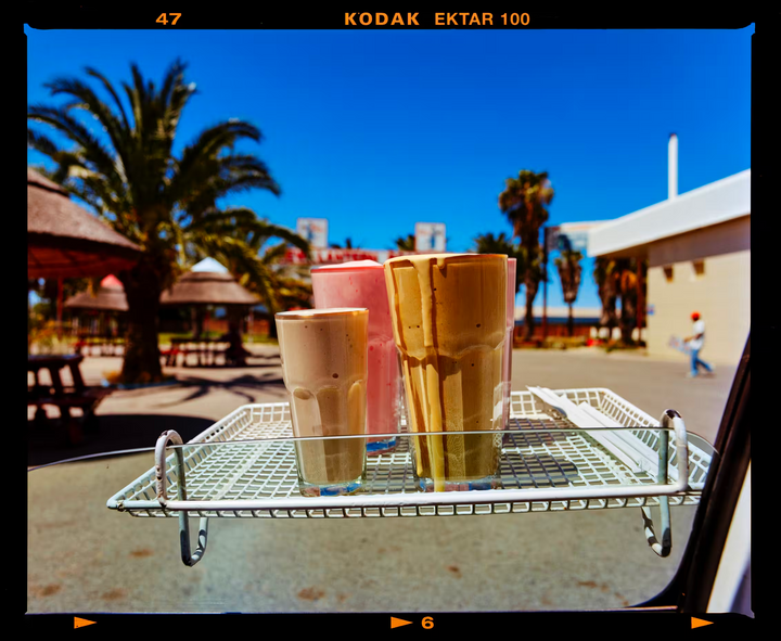 A Richard Heeps photographic print of three milkshakes, the title is Milkshakes (Film Rebate), Welkom, the Free State, 2009