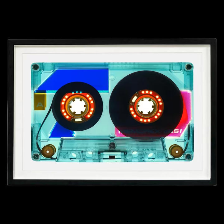 A framed limited edition photograph by Richard Heeps using vibrant colours, the title is Tape Collection 90 Minutes Vintage Blue