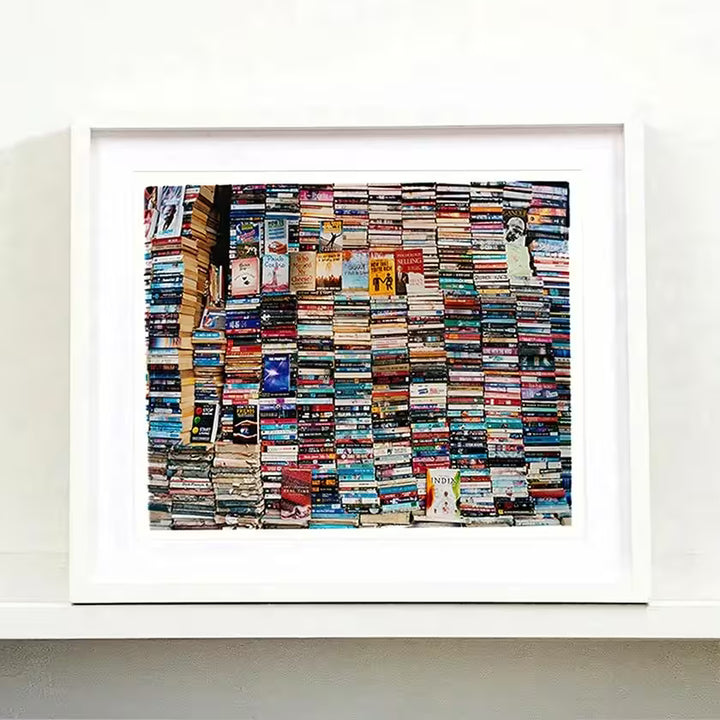 A white framed limited edition photograph by Richard Heeps using vibrant colours, the title is Mother India, Delhi, 2013