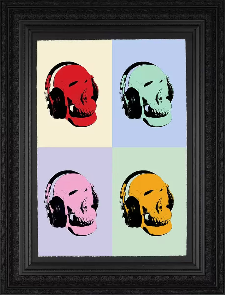 A Maxim limited edition of four skulls with headphones on in different colours, the title is Music Lover