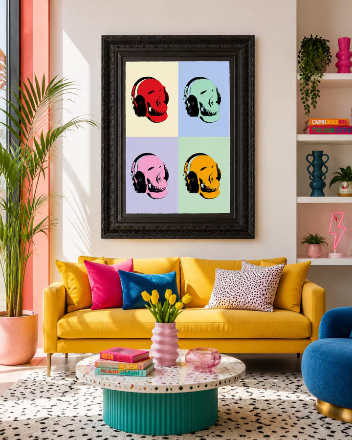 A Maxim limited edition of four skulls with headphones on in different colours, the title is Music Lover