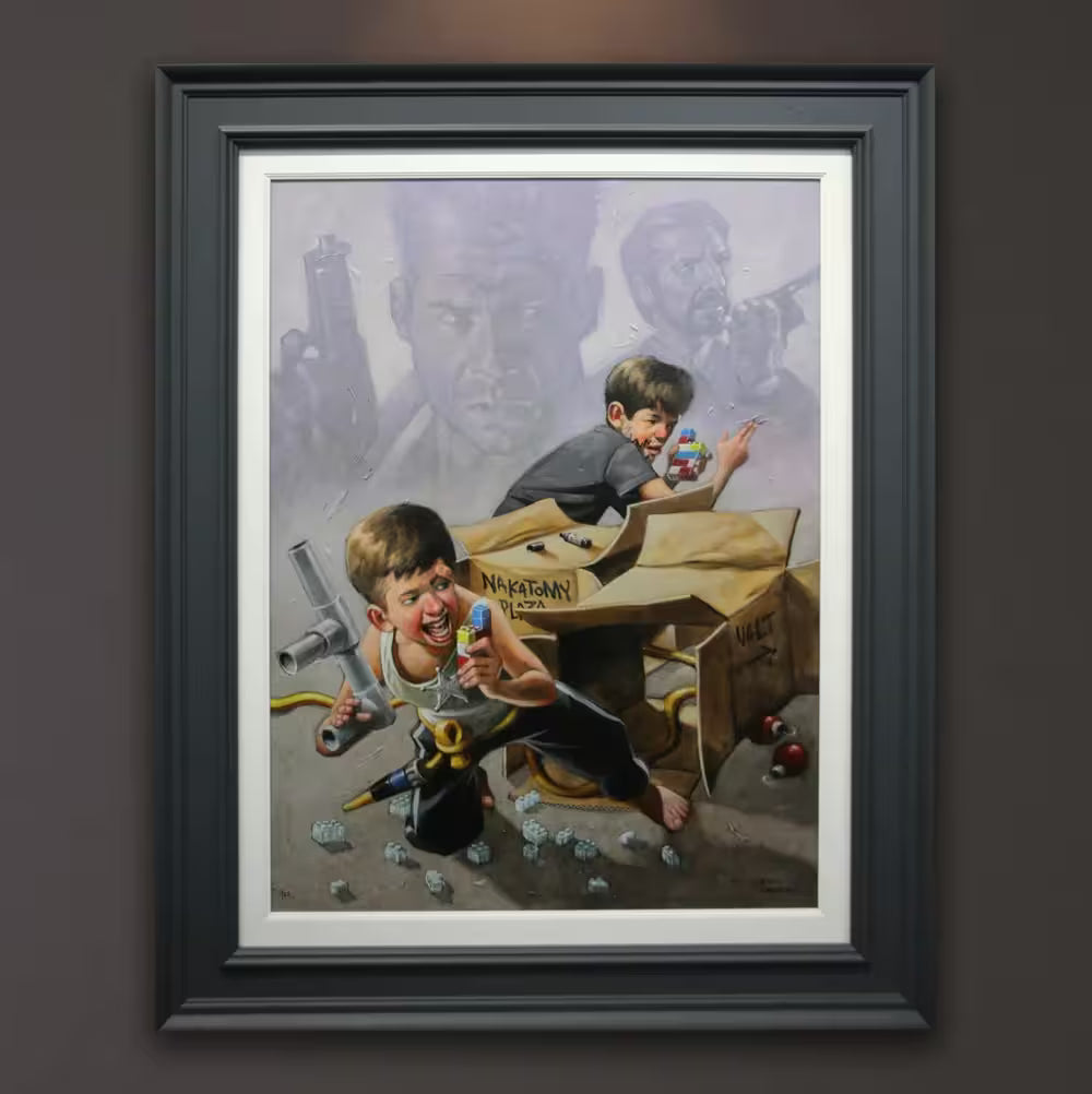 A Craig Davison limited edition piece of two boys pretending to sneak around each other on walkie talkies, the title is Now I Have A Machine Gun, Ho Ho Ho