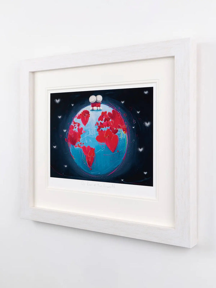 Doug Hyde “On Top of the World” artwork showing two figures sitting on a blue globe covered in red hearts against a dark sky.