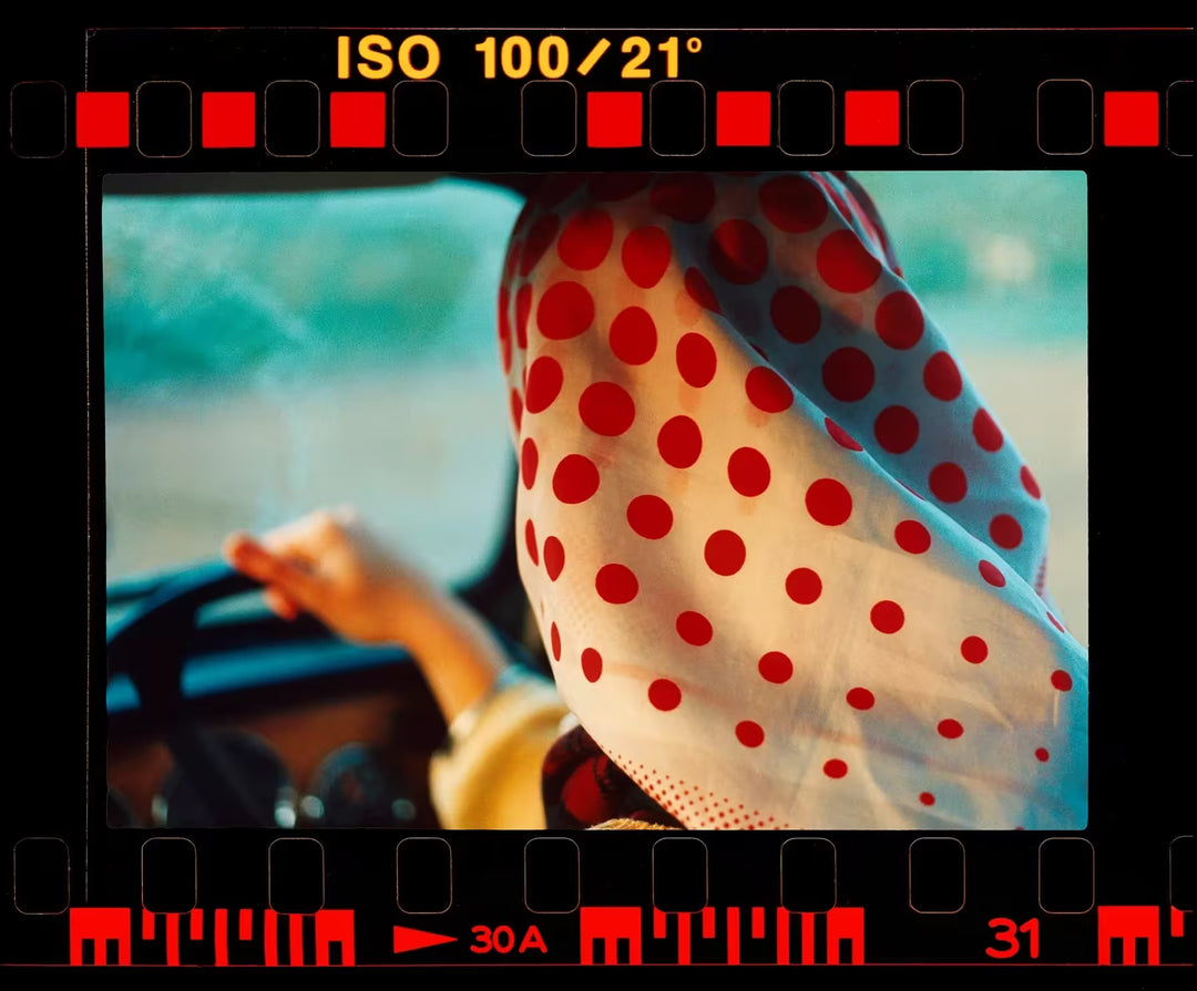 A limited edition photograph by Richard Heeps using vibrant colours, the title is On the Road Anita, Lady Fen, Welney, 1993