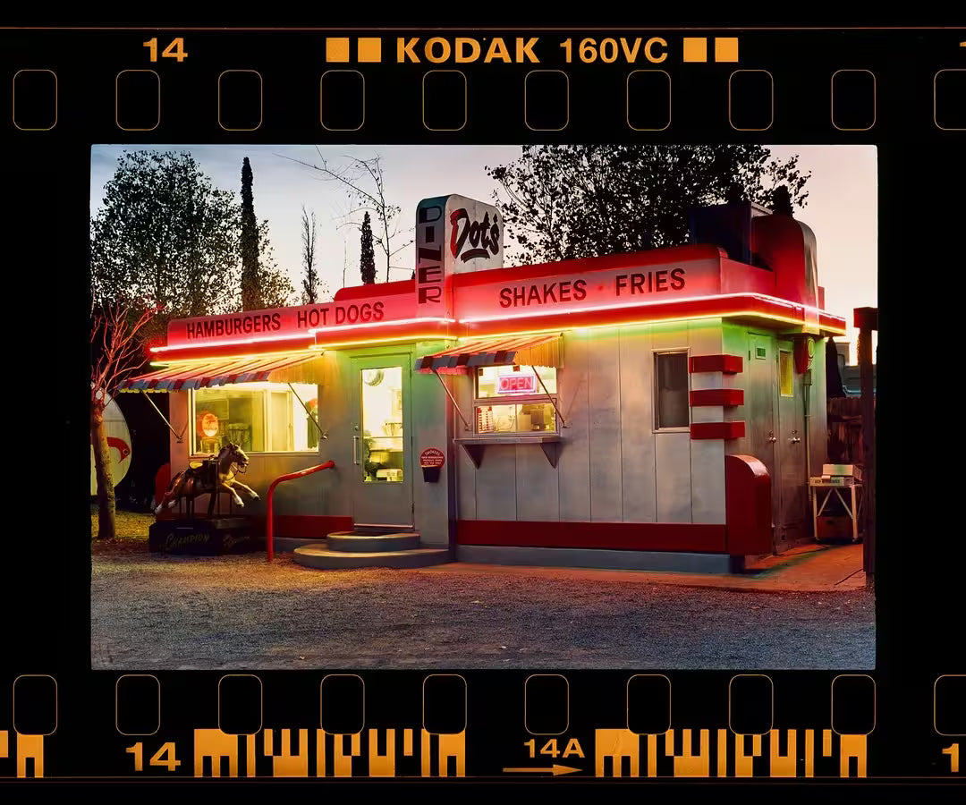 A limited edition photograph by Richard Heeps using vibrant colours, the title is On The Road~ Dot's Diner, Bisbee, Arizona, 2001