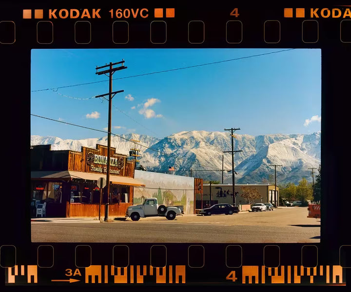 A limited edition photograph by Richard Heeps using vibrant colours, the title is On the Road Lone Pine, California, 2000