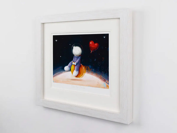 Over the Moon by Doug Hyde, an image of a spaceman riding a space hopper with hearts trailing behind available from Startle
