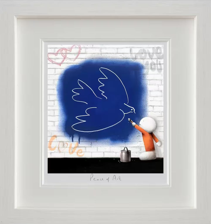 A Doug Hyde framed limited edition of a person in orange painting a white dove on a wall that has been spray painted blue, the title is Peace of Art