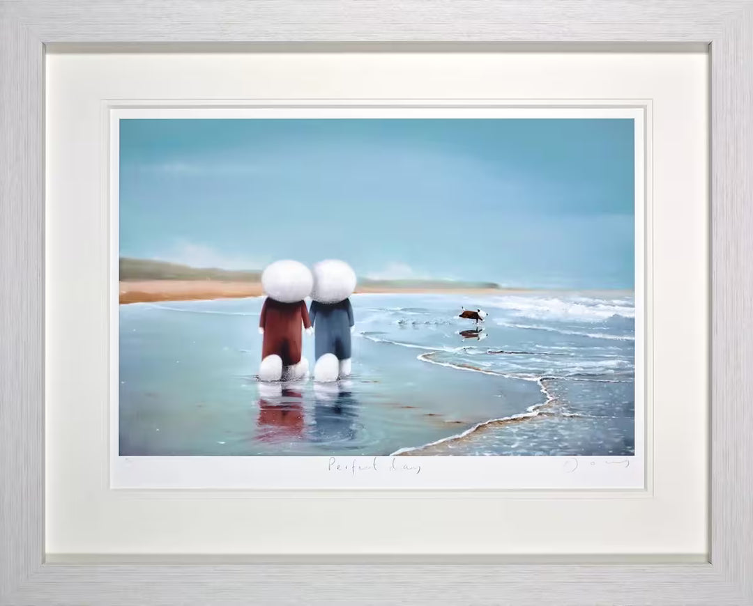A Doug Hyde framed limited edition print of two people in red and blue walking on a beach holding hands with a dog running into the sea,  the title is Perfect Day