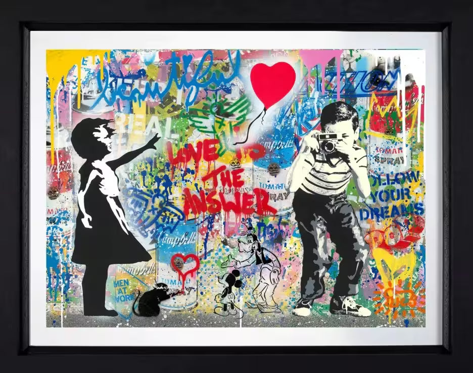 A Mr Brainwash framed original of a graffitied wall with lots of pop iconography including Banksy&