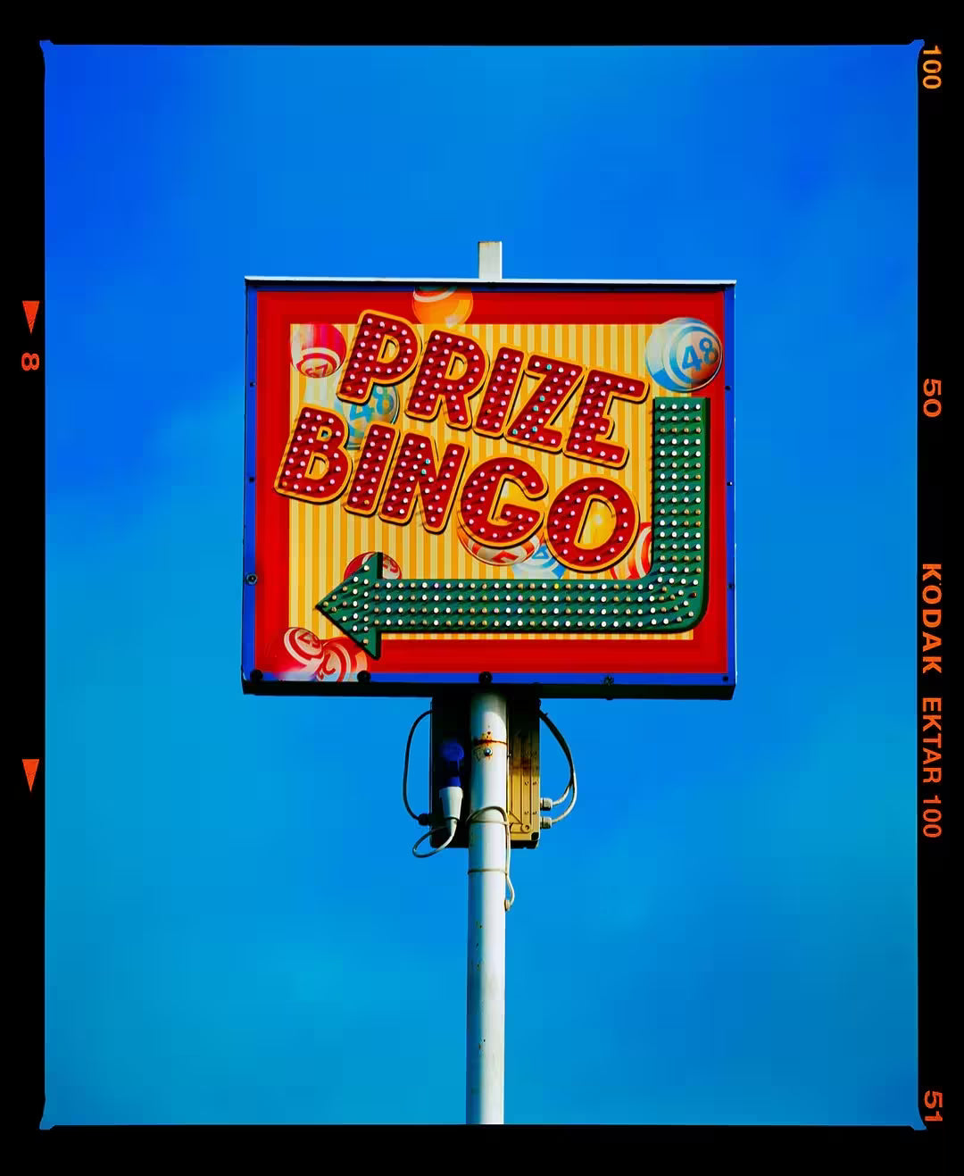 A limited edition photograph by Richard Heeps using vibrant colours, the title is Prize Bingo, Norfolk, 2023