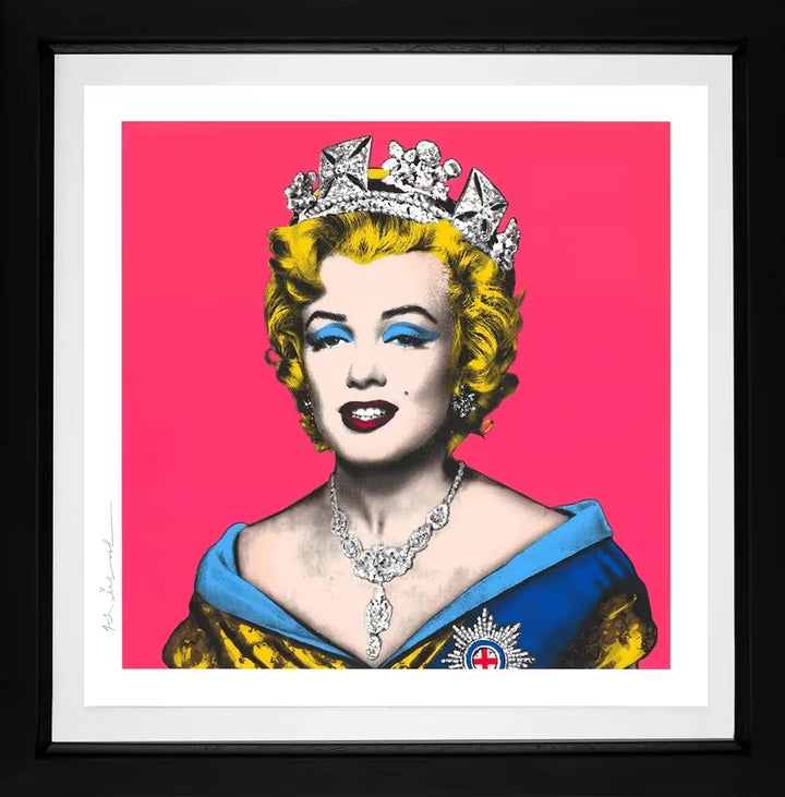 A Mr Brainwash framed limited edition of Marilyn Monroe in the crown jewels against a pink background, the title is Queen Marilyn (Pink)