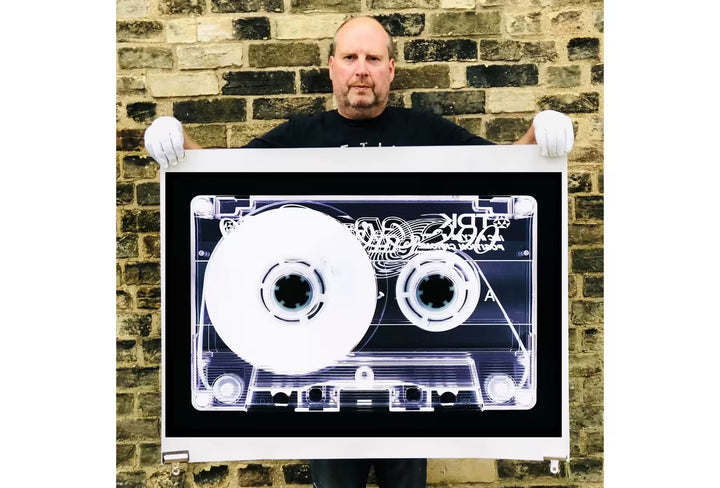 Richard Heeps holding Tape Collection &