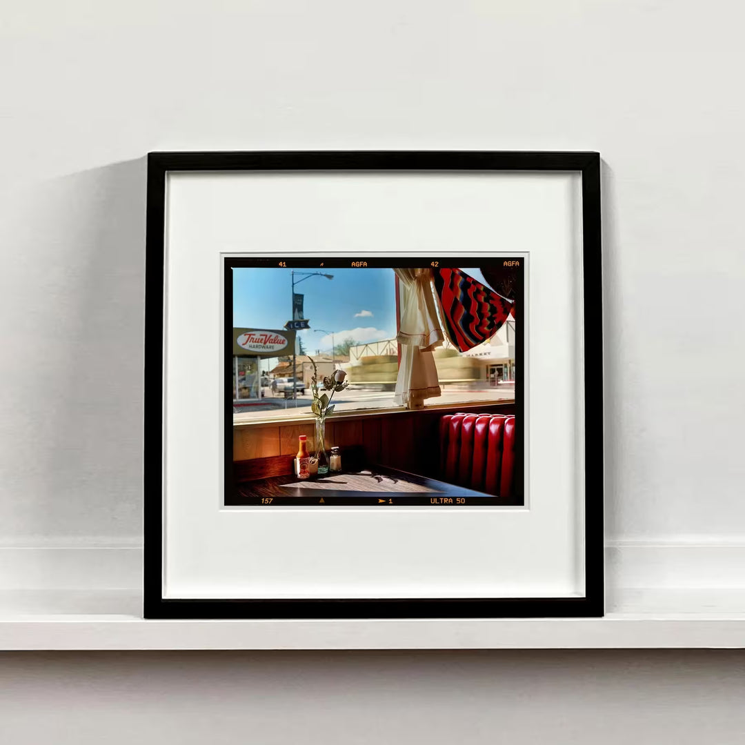 A framed limited edition photograph by Richard Heeps using vibrant colours, the title is Bonzanza Cafe (6x7 Film Rebate), Lone Pine, California, 2001 