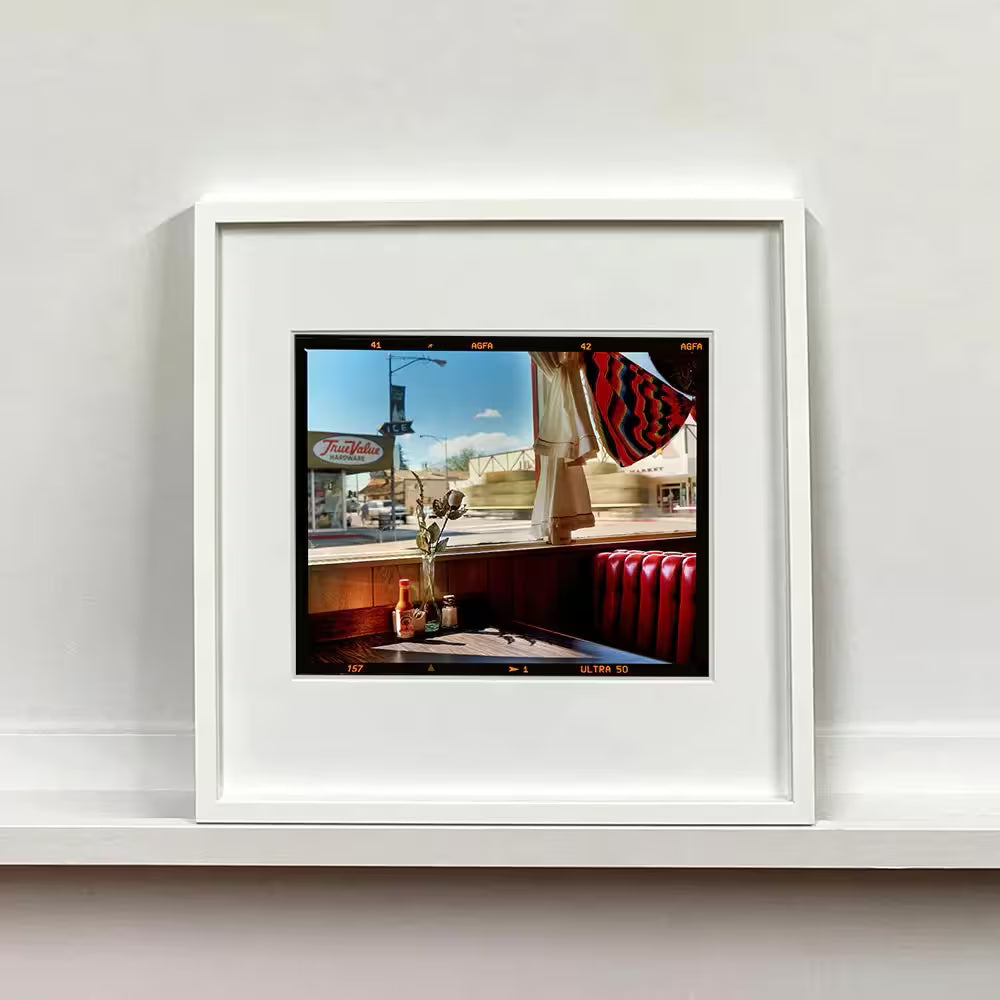 A framed limited edition photograph by Richard Heeps using vibrant colours, the title is Bonzanza Cafe (6x7 Film Rebate), Lone Pine, California, 2001 