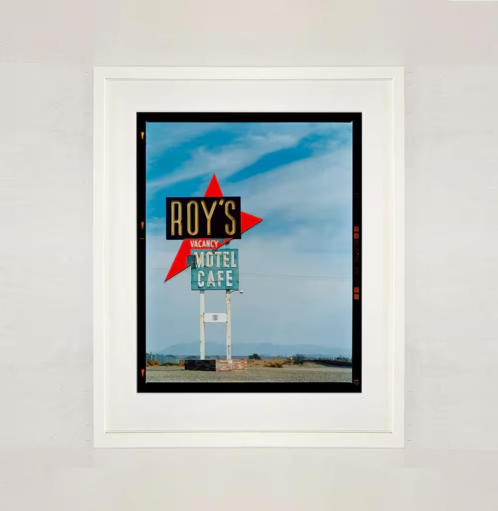 A white framed limited edition photograph by Richard Heeps using vibrant colours, the title is Roy&