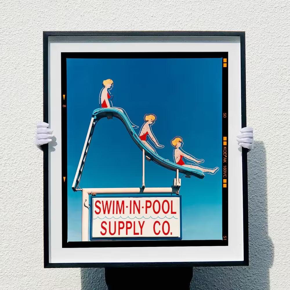 A framed limited edition photograph by Richard Heeps using vibrant colours, the title is Swim-in-Pool Supply Co. (Film Rebate), Las Vegas 2013