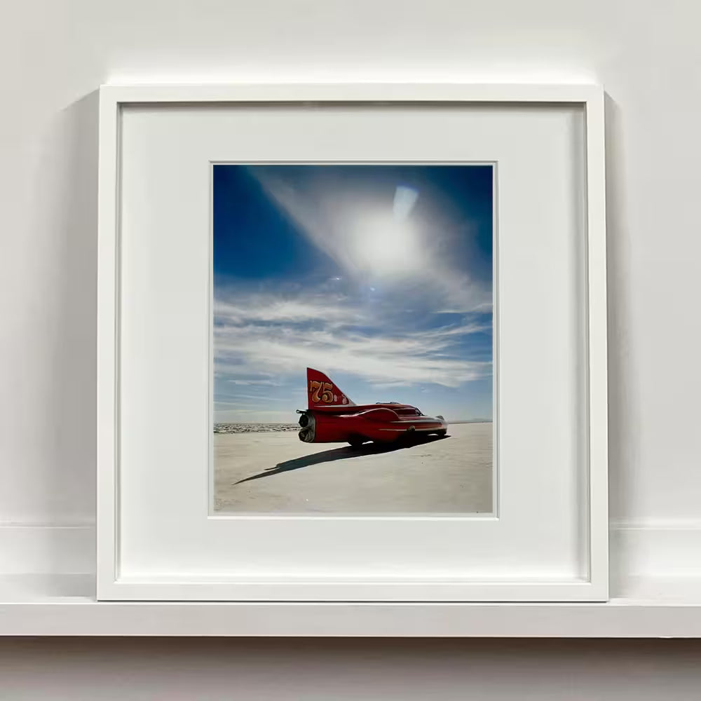 A white framed limited edition photograph by Richard Heeps using vibrant colours, the title is Rear Three Quarters, Bonneville, 2003