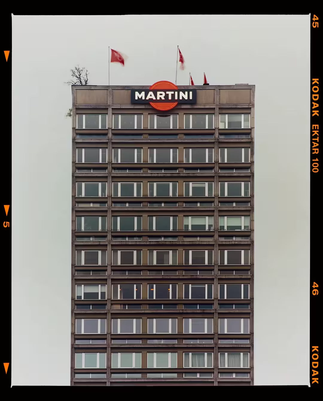 A limited edition photograph by Richard Heeps using vibrant colours, the title is Grey Martini (Film Rebate) Milan, 2019