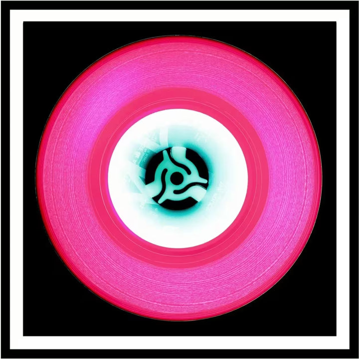 A framed limited edition photograph by Richard Heeps using vibrant colours, the title is Vinyl Collection &