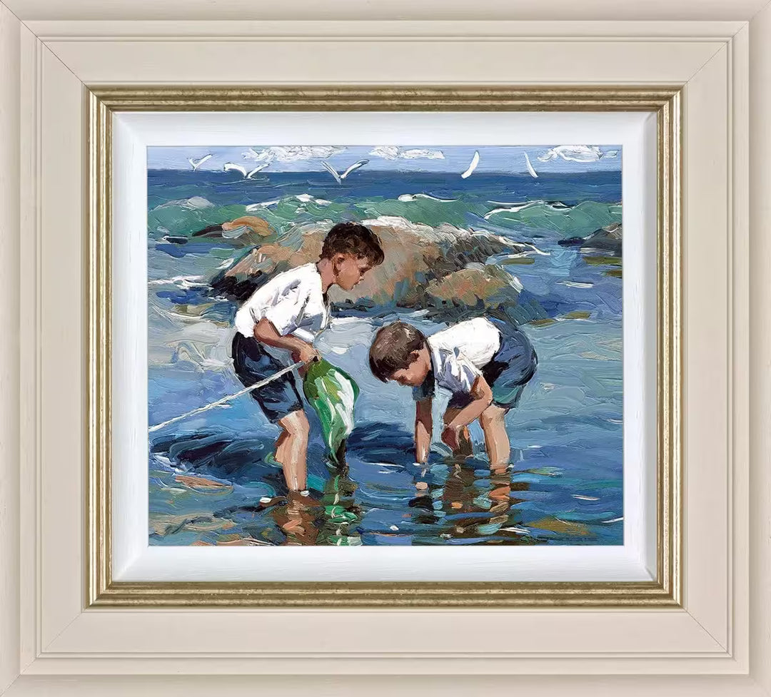 A Sherree Valentine Daines framed limited edition of two young boys in a rockpool, the title is Rockpool Treasures