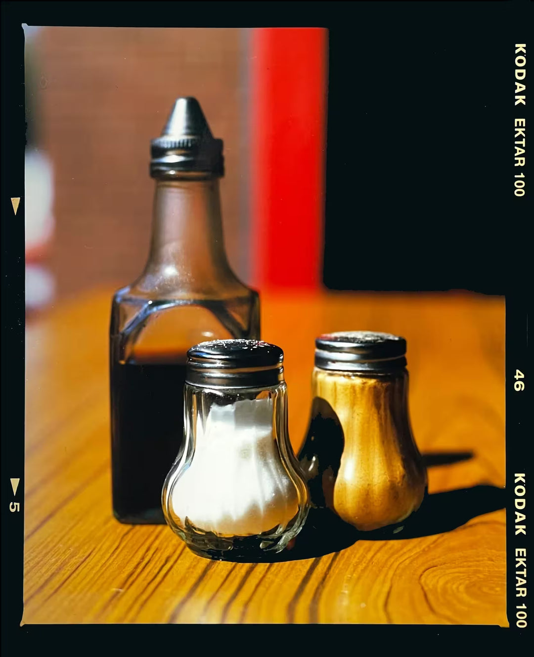 A limited edition photograph by Richard Heeps using vibrant colours, the title is Salt, Pepper, and Vinegar, Clacton-On-Sea, 2021