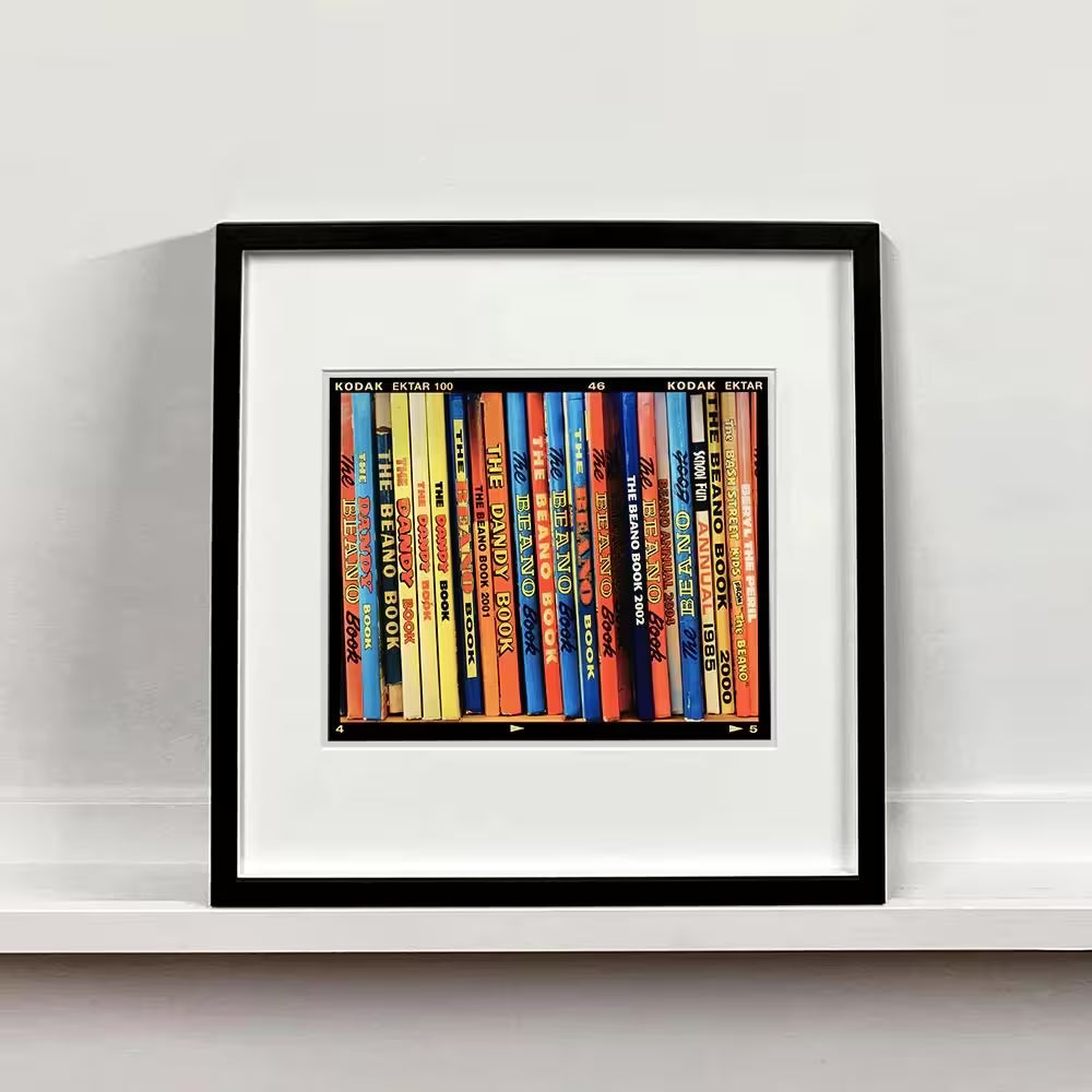 A framed limited edition photograph by Richard Heeps using vibrant colours, the title is School Fun, Burnham Market, 2018