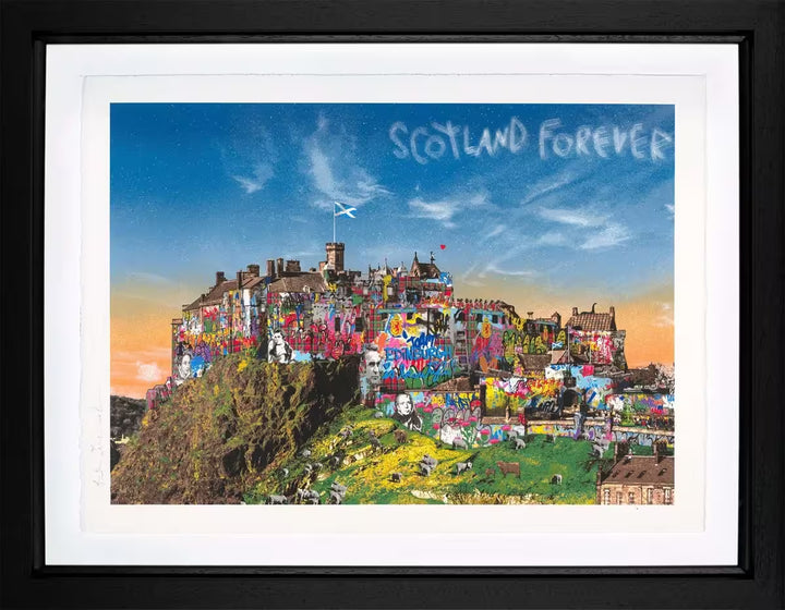 A Mr Brainwash framed limited edition of a Scottish castle that has been graffitied in front of a sunset, the title is Scotland Forever