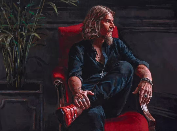 A Fabian Perez limited edition self portrait piece of Fabian sat on a red chair, the title is Self Portrait: 20 Years in Reflection