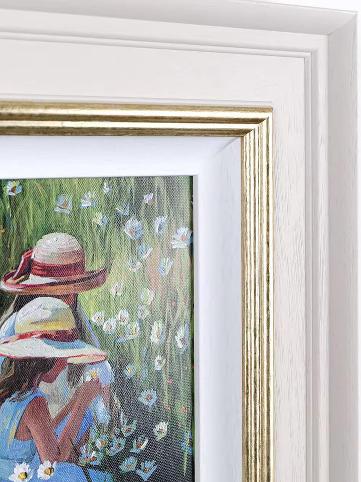 A Sherree Valentine Daines limited edition of two girls in summer dresses and hats picking daisies, the title is Shared Secrets