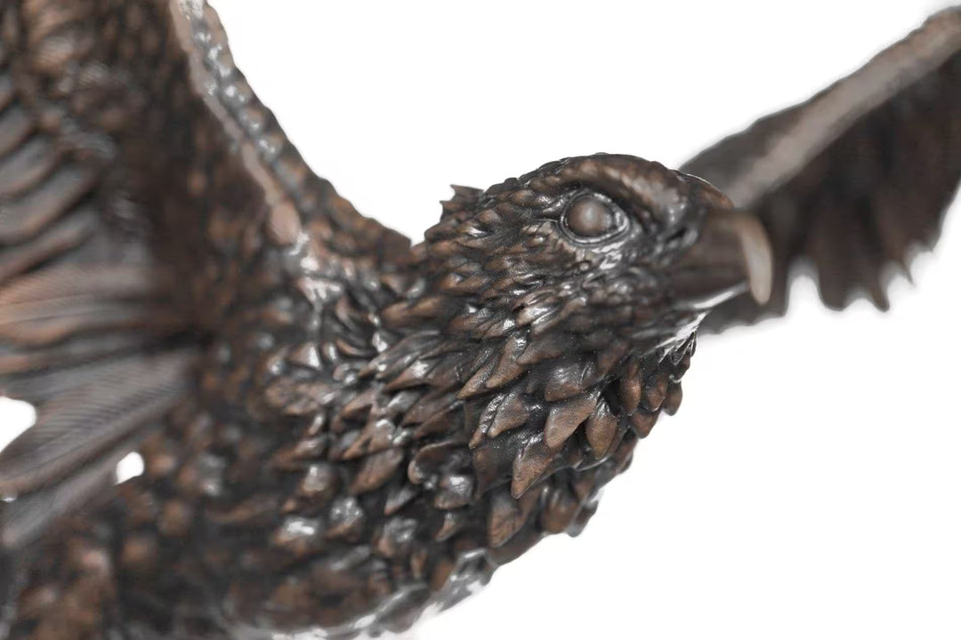 Close-up of a bronze eagle sculpture on a white background, Sky Bound by Dean Kendrick