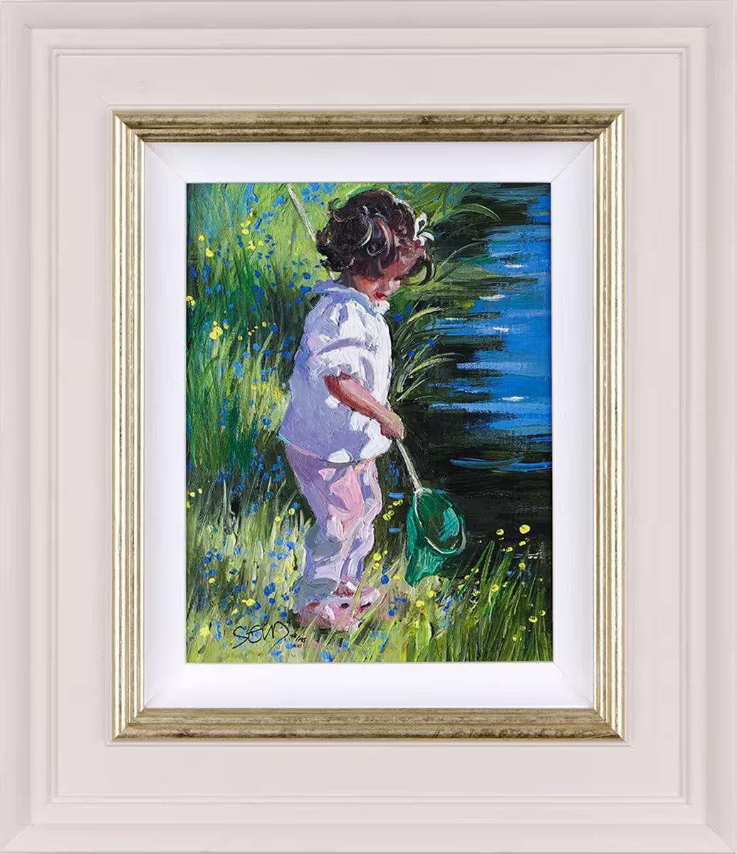 A Sherree Valentine Daines framed limited edition of a small girl stood by a stream holding a net, the title is Small Wonders