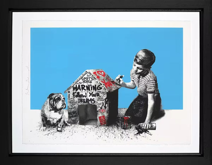 A Mr Brainwash framed limited edition of a boy graffitiing a dog house with the dog sat next to the house, the title is Spot&